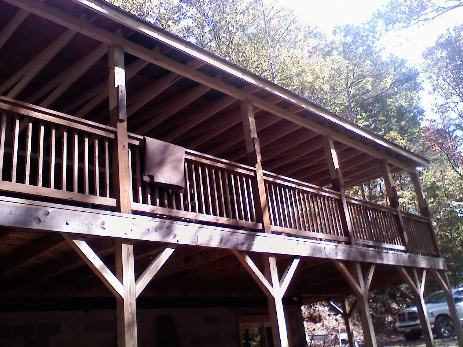 Timber framing under a new elevated porch and deck — Roof Leak Repair in Uehling by Roofing Brothers